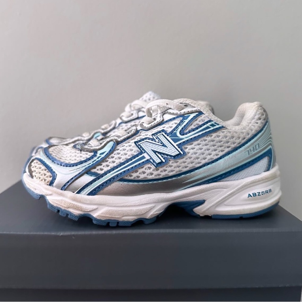 New Balance White and Light Blue Running Shoes